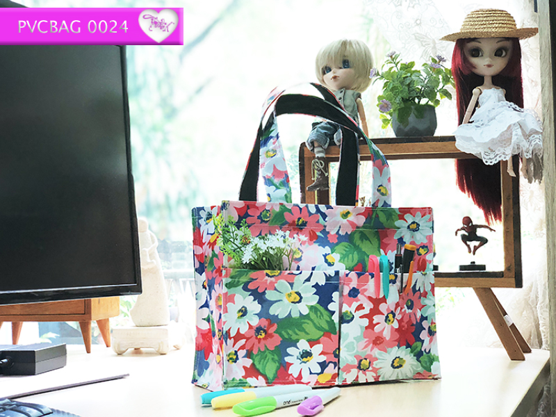 กระเป๋าผ้าเคลือบ PVC กันน้ำ ใส่เอกสาร (A5) คราม.ดอกเดซี่เพ้น