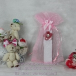 พวงกุญแจหนังเทียมแพคถุงผ้า